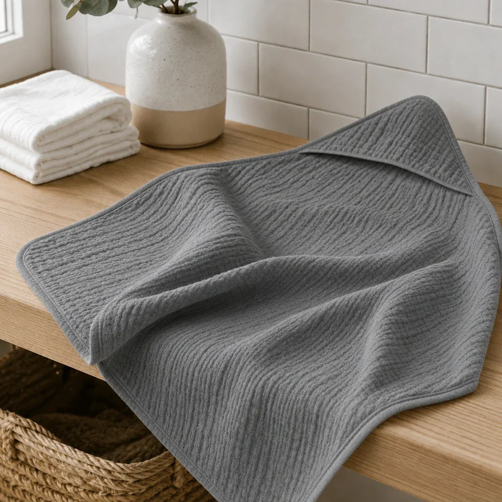 Cape de bain bébé en mousseline