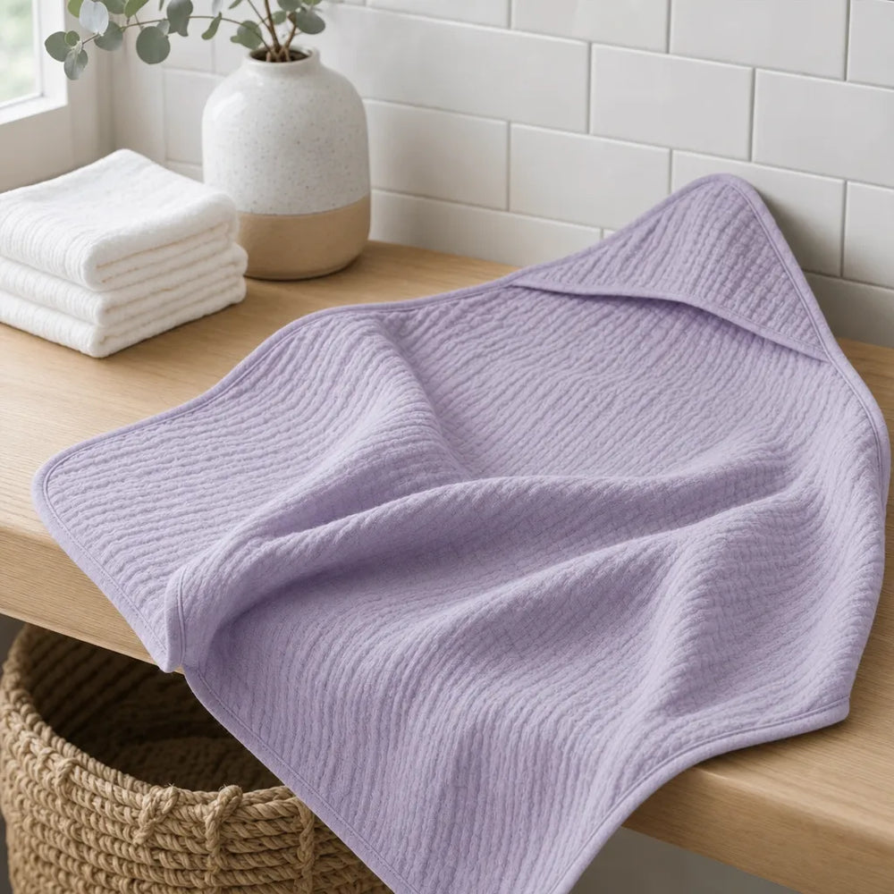 Cape de bain bébé en mousseline