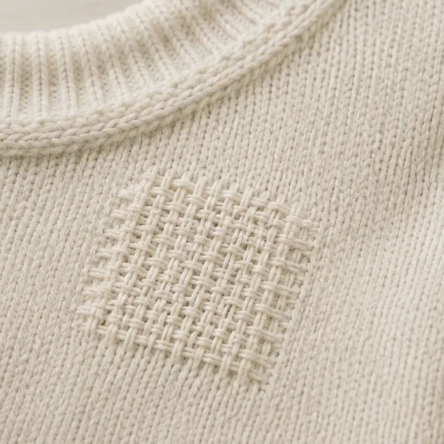 Le même pull, trou refermé avec Wove